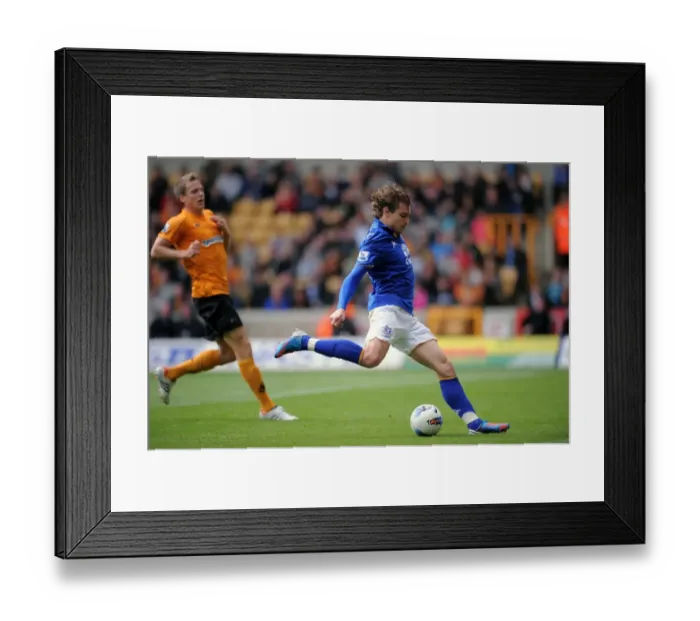 Framed Print : Jelavic Unleashes Powerful Shot: Everton's Threat at Molineux Against Wolves Framed Print : Jelavic Unleashes Powerful Shot: Everton's Threat at Molineux Against Wolves