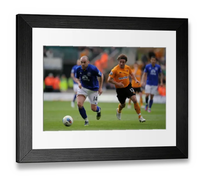 Framed Print : McFadden vs. Hunt: A Premier League Battle at Molineux