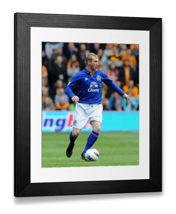 Framed Print : Tony Hibbert vs. Wolverhampton Wanderers: Everton's Defender Faces Off in Barclays Premier League Showdown (May 2012) Framed Print : Tony Hibbert vs. Wolverhampton Wanderers: Everton's Defender Faces Off in Barclays Premier League Showdown (May 2012)
