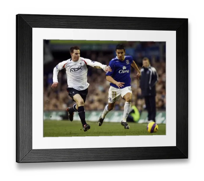 Framed Print : Tim Cahill vs Danny Guthrie: A Premier League Battle at Goodison Park, 2007 - Everton vs Bolton Wanderers