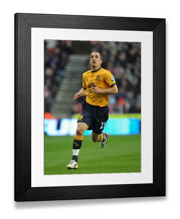 Framed Print : Leon Osman vs Stoke City: Everton's Battle at Britannia Stadium (May 2012)