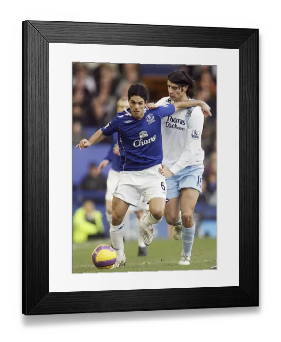 Framed Print : Mikel Arteta vs Vedran Corluka: A Premier League Battle at Goodison Park (12 / 1 / 08) Framed Print : Mikel Arteta vs Vedran Corluka: A Premier League Battle at Goodison Park (12 / 1 / 08)