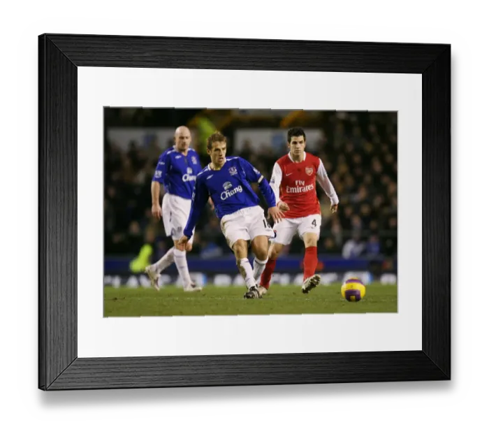 Framed Print : Football - Everton v Arsenal Barclays - Premier League - Goodison Park - 07 / 08 - 29 / 12 / 07 Evertons Phil Neville in action against Arsenals Cesc Fabregas Mandatory Credit: Action Images / Carl Recine Framed Print : Football - Everton v Arsenal Barclays - Premier League - Goodison Park - 07 / 08 - 29 / 12 / 07 Evertons Phil Neville in action against Arsenals Cesc Fabregas Mandatory Credit: Action Images / Carl Recine