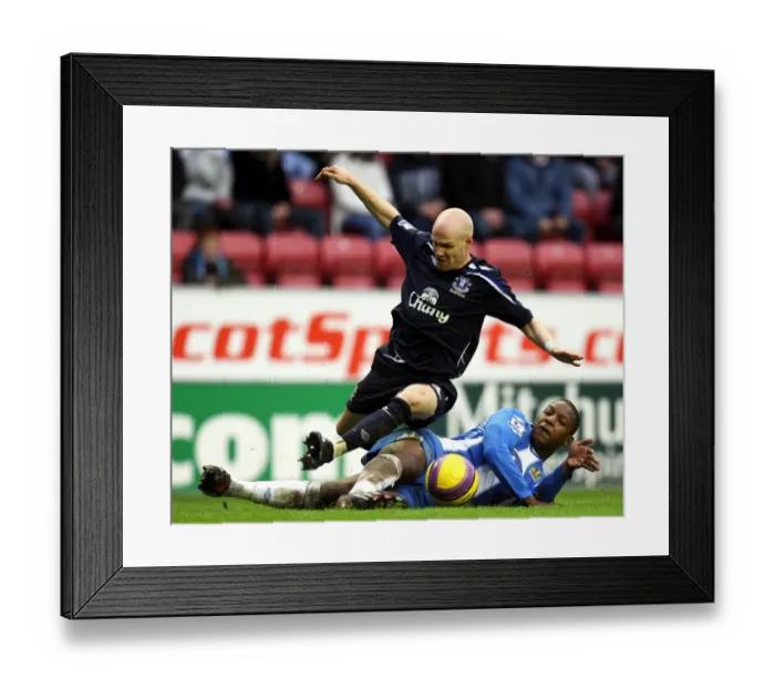 Framed Print : Intense Rivalry: Johnson vs. Bramble Clash in Premier League: Everton vs. Wigan (January 2008) Framed Print : Intense Rivalry: Johnson vs. Bramble Clash in Premier League: Everton vs. Wigan (January 2008)