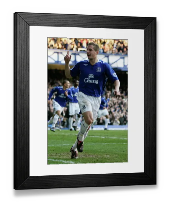 Framed Print : Football - Everton v Reading - Barclays Premier League - Goodison Park - 07 / 08 - 9 / 2 / 08 Phil Jagielka celebrates scoring the first goal for Everton Mandatory Credit: Action Images / Carl Recine Framed Print : Football - Everton v Reading - Barclays Premier League - Goodison Park - 07 / 08 - 9 / 2 / 08 Phil Jagielka celebrates scoring the first goal for Everton Mandatory Credit: Action Images / Carl Recine