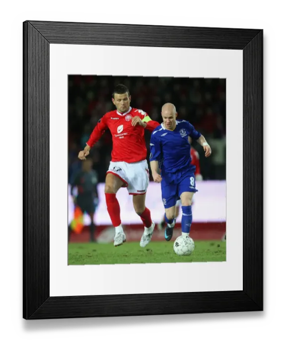 Framed Print : Johnson vs. Bakke: Everton's Intense Battle in UEFA Cup Clash at Brann Stadium Framed Print : Johnson vs. Bakke: Everton's Intense Battle in UEFA Cup Clash at Brann Stadium