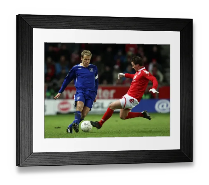 Framed Print : Phil Neville vs. Petter Vaagan Moen: Everton vs. SK Brann in UEFA Cup Third Round First Leg Framed Print : Phil Neville vs. Petter Vaagan Moen: Everton vs. SK Brann in UEFA Cup Third Round First Leg