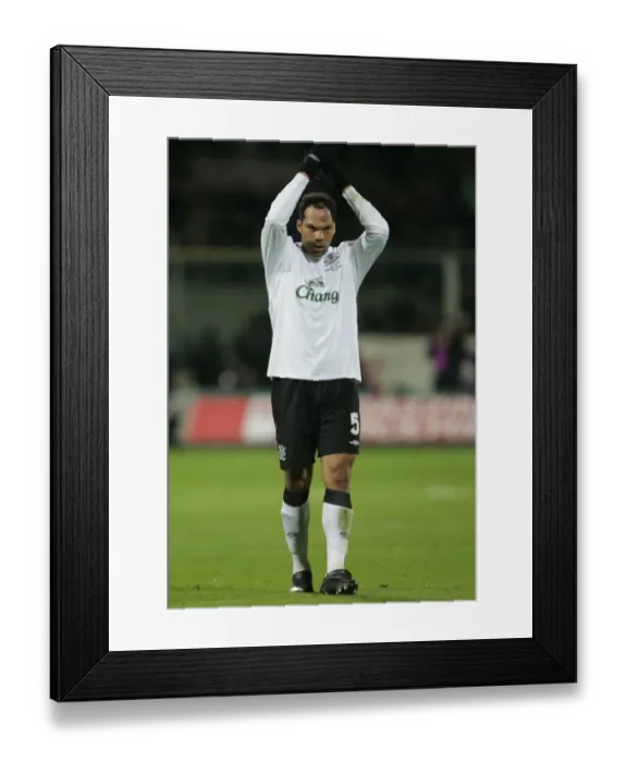 Framed Print : Everton's Joleon Lescott Salutes Fans After UEFA Cup Match vs Fiorentina (2008) Framed Print : Everton's Joleon Lescott Salutes Fans After UEFA Cup Match vs Fiorentina (2008)