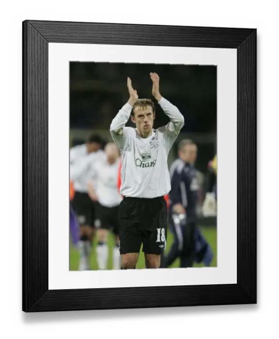 Framed Print : Everton's Phil Neville Celebrates with Fans after UEFA Cup Match vs Fiorentina (2008) Framed Print : Everton's Phil Neville Celebrates with Fans after UEFA Cup Match vs Fiorentina (2008)