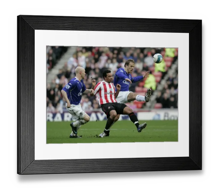 Framed Print : Everton's Johnson and Neville in Action: Everton vs. Sunderland, Barclays Premier League, September 3, 2008