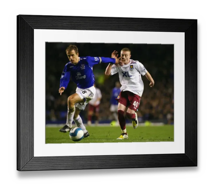 Framed Print : Phil Neville vs Freddie Sears: Everton vs West Ham United, Barclays Premier League, March 22, 2008