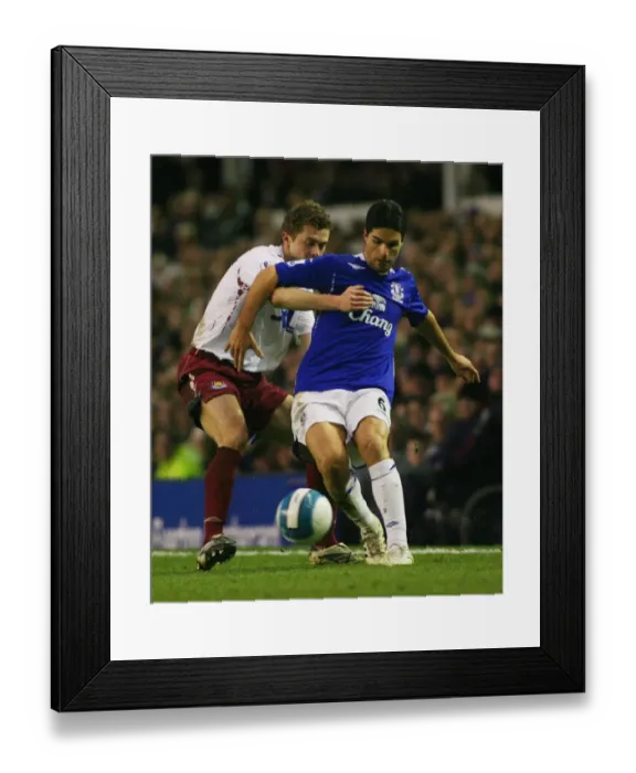 Framed Print : Mikel Arteta vs. George McCartney: A Battle at Goodison Park - Everton vs. West Ham United, Barclays Premier League, March 22, 2008 Framed Print : Mikel Arteta vs. George McCartney: A Battle at Goodison Park - Everton vs. West Ham United, Barclays Premier League, March 22, 2008