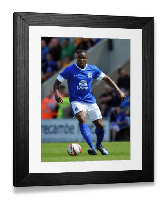 Framed Print : Victor Anichebe's Shining Performance: Everton's Pre-Season Victory over Morecambe at Globe Arena Framed Print : Victor Anichebe's Shining Performance: Everton's Pre-Season Victory over Morecambe at Globe Arena