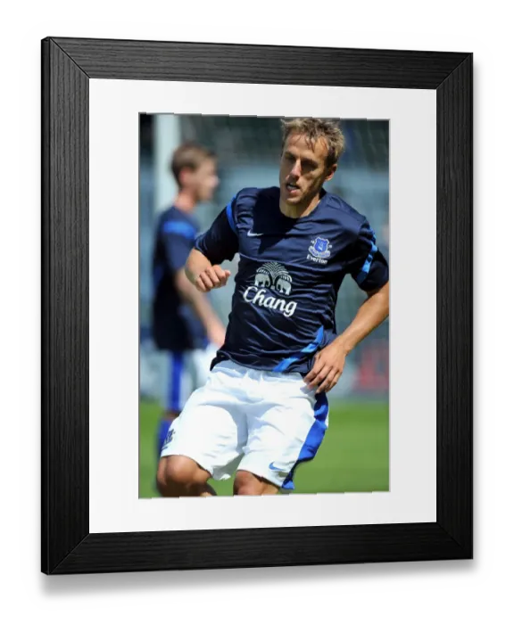 Framed Print : Phil Neville in Action: Everton FC's Pre-Season Friendly Against Morecambe at Globe Arena Framed Print : Phil Neville in Action: Everton FC's Pre-Season Friendly Against Morecambe at Globe Arena