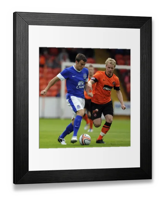 Framed Print : Seamus Coleman vs Gary Mackay-Steven: A Pre-Season Battle at Tannadice Park
