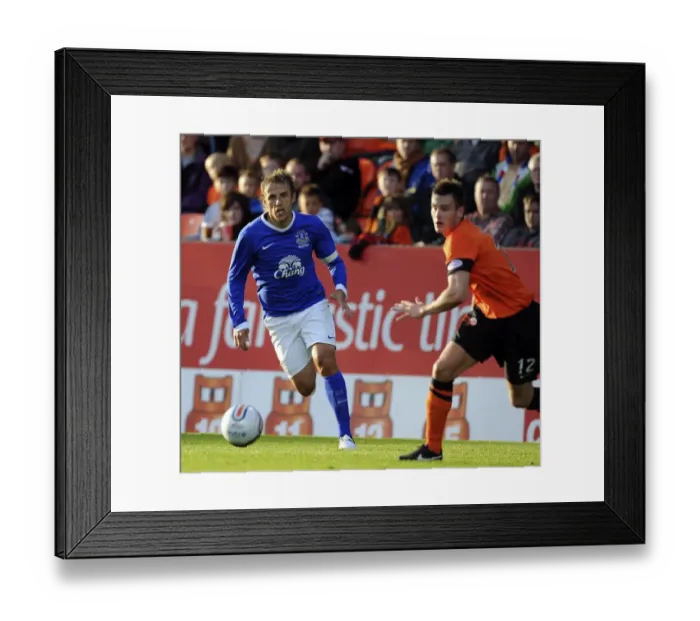 Framed Print : Everton's Phil Neville in Action: Pre-Season Friendly at Dundee United's Tannadice Park Framed Print : Everton's Phil Neville in Action: Pre-Season Friendly at Dundee United's Tannadice Park