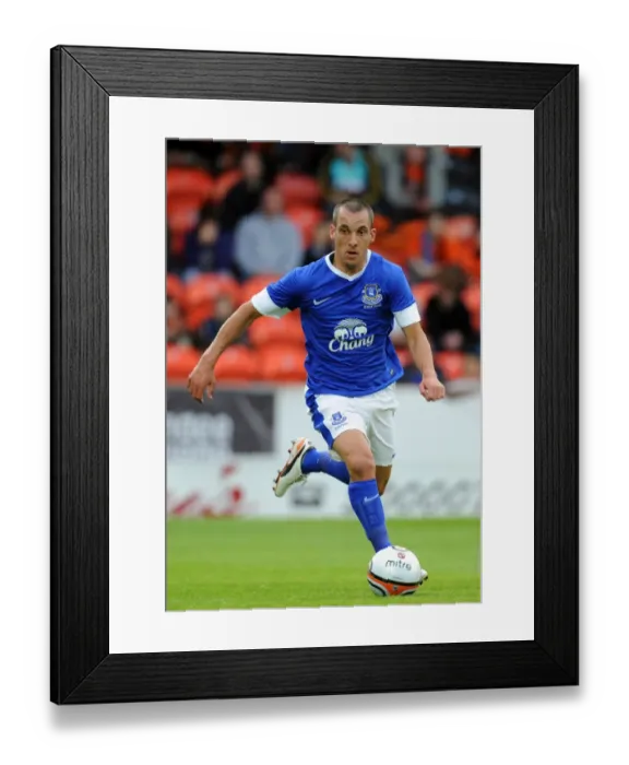 Framed Print : Leon Osman Leads Everton at Tannadice Park: Pre-Season Friendly Against Dundee United Framed Print : Leon Osman Leads Everton at Tannadice Park: Pre-Season Friendly Against Dundee United