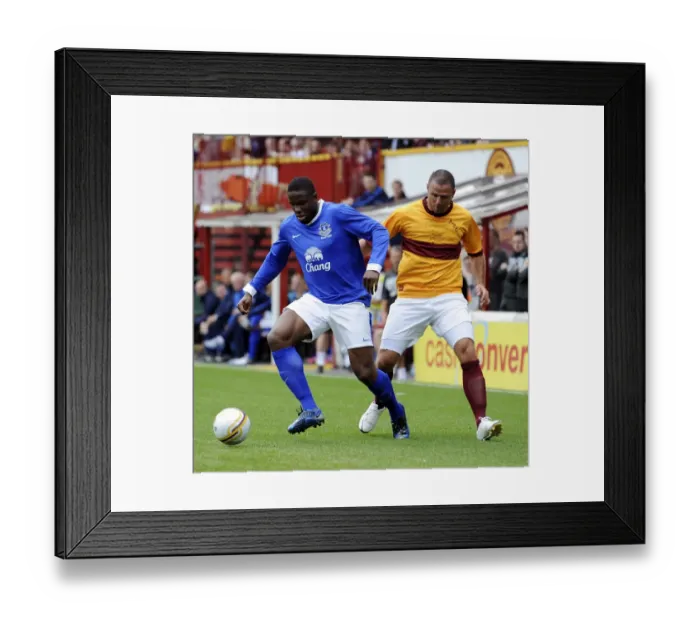 Framed Print : Anichebe Strikes: Everton's Victor Scores Past Michael Higdon at Fir Park Framed Print : Anichebe Strikes: Everton's Victor Scores Past Michael Higdon at Fir Park