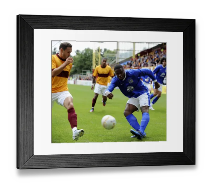 Framed Print : Anichebe vs. Hateley: A Fiery Clash in Motherwell vs. Everton Pre-Season Friendly at Fir Park Stadium Framed Print : Anichebe vs. Hateley: A Fiery Clash in Motherwell vs. Everton Pre-Season Friendly at Fir Park Stadium