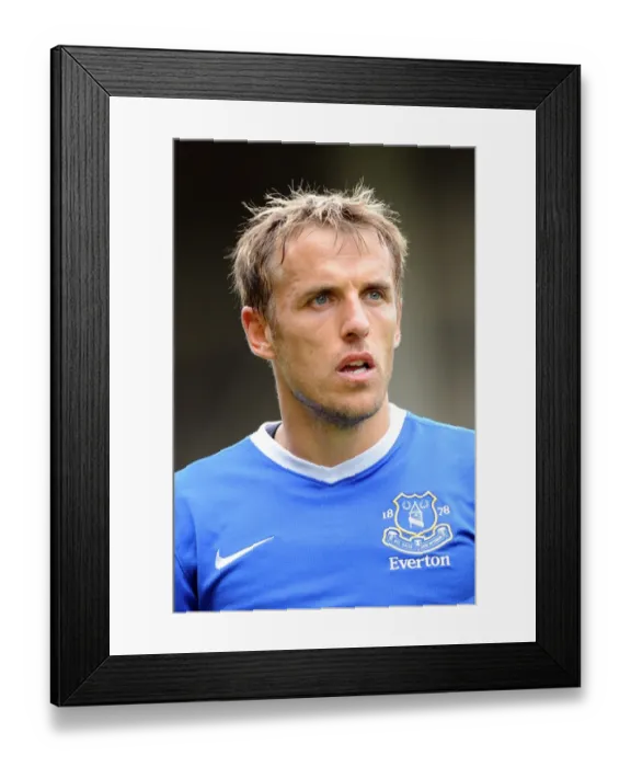 Framed Print : Phil Neville in Action: Motherwell vs. Everton Pre-Season Friendly at Fir Park Stadium Framed Print : Phil Neville in Action: Motherwell vs. Everton Pre-Season Friendly at Fir Park Stadium