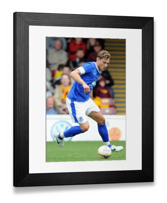 Framed Print : Nikica Jelavic in Action: Everton's Pre-Season Thriller at Motherwell's Fir Park Stadium Framed Print : Nikica Jelavic in Action: Everton's Pre-Season Thriller at Motherwell's Fir Park Stadium