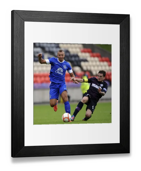 Framed Print : Hope vs Paton: A Fierce Rivalry Unfolds in Everton's Pre-Season Clash against Partick Thistle Framed Print : Hope vs Paton: A Fierce Rivalry Unfolds in Everton's Pre-Season Clash against Partick Thistle