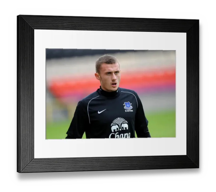 Framed Print : Everton's Taudul Stands Firm: Pre-Season Battle at Firhill Stadium Framed Print : Everton's Taudul Stands Firm: Pre-Season Battle at Firhill Stadium