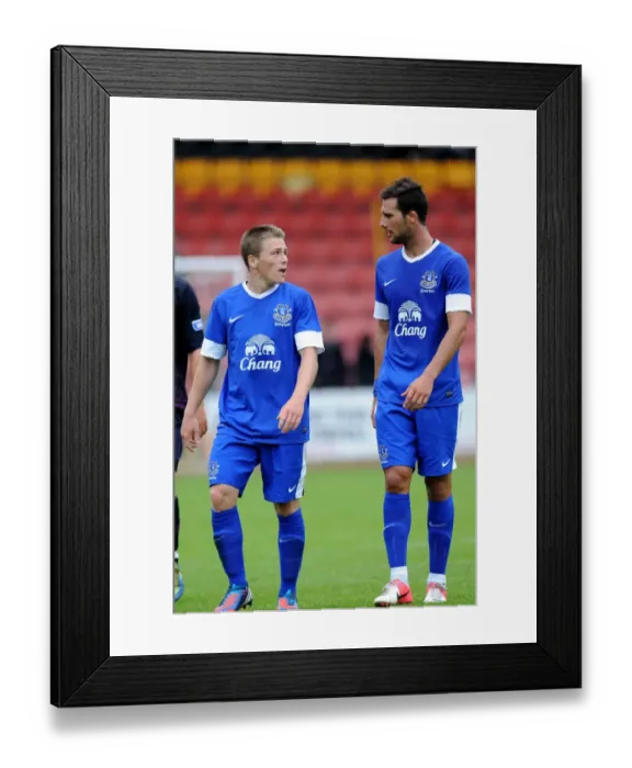 Framed Print : George Green and Apostolos Vellios in Action: Everton's Pre-Season Friendly vs. Partick Thistle at Firhill Stadium Framed Print : George Green and Apostolos Vellios in Action: Everton's Pre-Season Friendly vs. Partick Thistle at Firhill Stadium