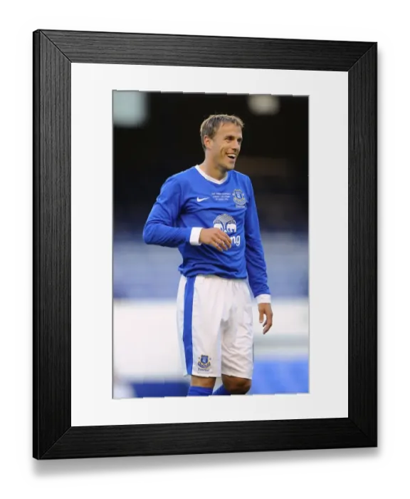 Framed Print : Laughing Neville: A Light-Hearted Moment as Hibbert Takes a Pre-Season Shot (Everton vs AEK Athens, Goodison Park) Framed Print : Laughing Neville: A Light-Hearted Moment as Hibbert Takes a Pre-Season Shot (Everton vs AEK Athens, Goodison Park)