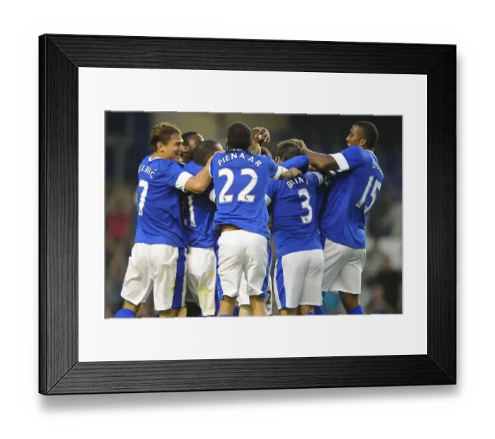 Framed Print : Everton's Tony Hibbert Celebrates Euphoric Goal Surrounded by Jubilant Team Mates (Everton vs AEK Athens, Pre-Season Friendly, Goodison Park) Framed Print : Everton's Tony Hibbert Celebrates Euphoric Goal Surrounded by Jubilant Team Mates (Everton vs AEK Athens, Pre-Season Friendly, Goodison Park)