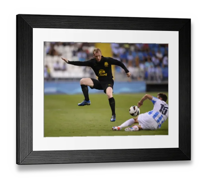 Framed Print : Hibbert vs Monreal: A Battle at La Rosaleda - Everton vs Malaga Pre-Season Friendly