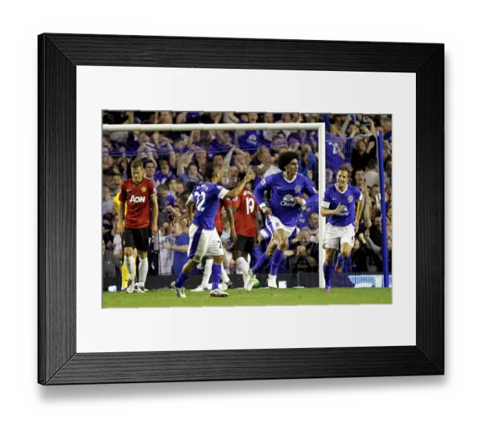 Framed Print : Fellaini's Stunner: Everton's Historic First Goal Against Manchester United in 2012 (1-0) Framed Print : Fellaini's Stunner: Everton's Historic First Goal Against Manchester United in 2012 (1-0)