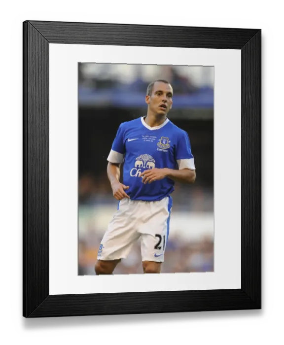 Framed Print : Leon Osman in Action: Everton's Pre-Season Battle against AEK Athens at Goodison Park Framed Print : Leon Osman in Action: Everton's Pre-Season Battle against AEK Athens at Goodison Park