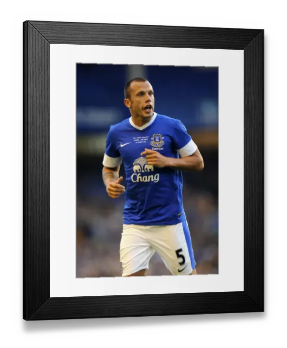 Framed Print : Everton's John Heitinga in Action: Pre-Season Friendly vs AEK Athens at Goodison Park Framed Print : Everton's John Heitinga in Action: Pre-Season Friendly vs AEK Athens at Goodison Park