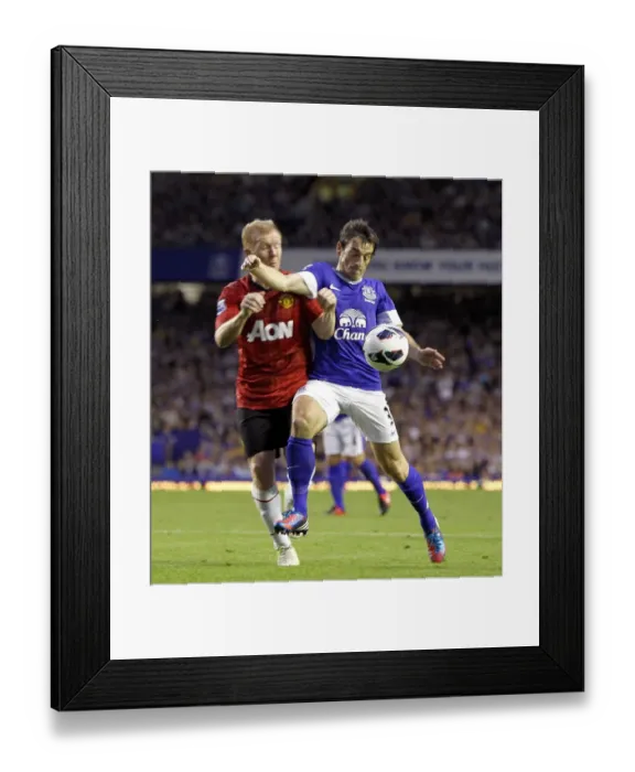 Framed Print : Intense Battle for Ball Possession: Scholes vs. Baines at Goodison Park (Everton 1 - Manchester United 0, Barclays Premier League, 2012) Framed Print : Intense Battle for Ball Possession: Scholes vs. Baines at Goodison Park (Everton 1 - Manchester United 0, Barclays Premier League, 2012)