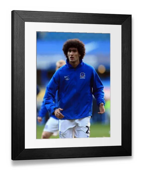 Framed Print : Marouane Fellaini's Intense Focus: Everton's Warm-Up Before the Epic Showdown against Manchester United (Everton 1-0, Barclays Premier League, 20-08-2012)