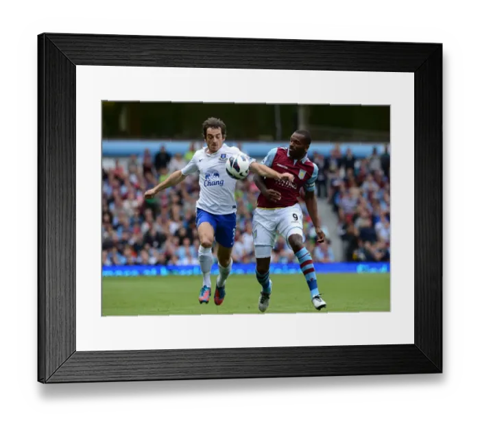 Framed Print : Baines Victory: Everton's Dominant Performance Against Aston Villa (3-1, Villa Park, 2012): Leighton Baines vs. Darren Bent Framed Print : Baines Victory: Everton's Dominant Performance Against Aston Villa (3-1, Villa Park, 2012): Leighton Baines vs. Darren Bent