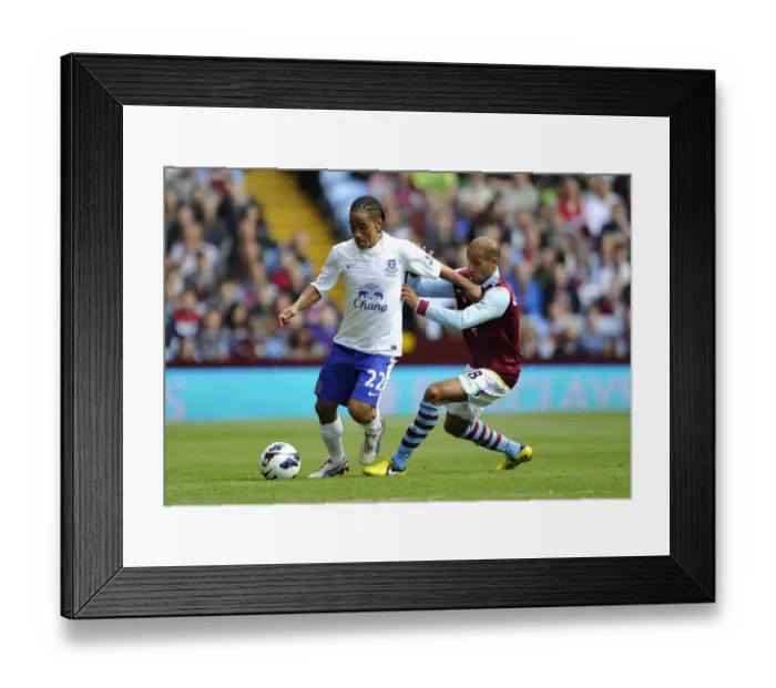Framed Print : Battle for the Ball: El Ahmadi vs. Pienaar - Aston Villa vs. Everton, Premier League (25-08-2012)