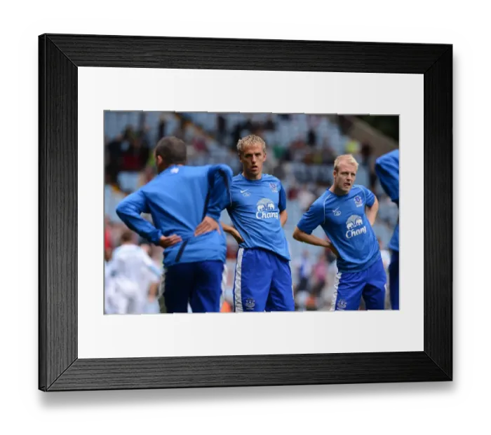Framed Print : Everton FC: Phil Neville and Teammates Stretching During Warm-Up at Villa Park before Aston Villa vs Everton (25-08-2012) Framed Print : Everton FC: Phil Neville and Teammates Stretching During Warm-Up at Villa Park before Aston Villa vs Everton (25-08-2012)