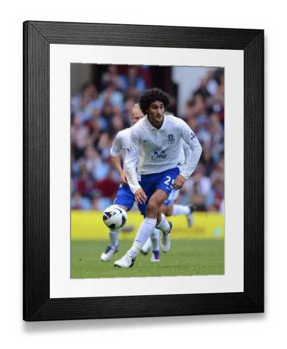 Framed Print : Marouane Fellaini's Brilliant Performance: Everton's Triumph Over Aston Villa (3-1, August 25, 2012) Framed Print : Marouane Fellaini's Brilliant Performance: Everton's Triumph Over Aston Villa (3-1, August 25, 2012)