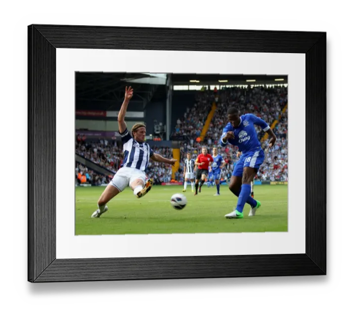 Framed Print : Jonas Olsson Blocks Victor Anichebe's Shot: West Bromwich Albion vs. Everton (01-09-2012) Framed Print : Jonas Olsson Blocks Victor Anichebe's Shot: West Bromwich Albion vs. Everton (01-09-2012)
