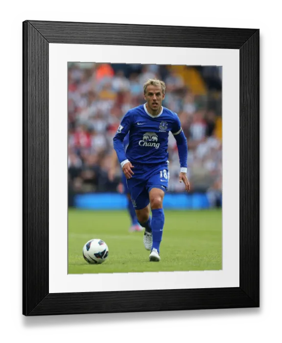 Framed Print : Everton's 2-0 Triumph over West Bromwich Albion: Phil Neville's Leading Performance Framed Print : Everton's 2-0 Triumph over West Bromwich Albion: Phil Neville's Leading Performance