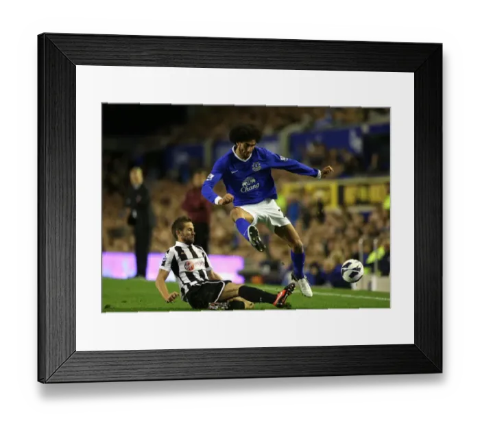 Framed Print : Fellaini vs. Cabaye: A Premier League Rivalry - Everton vs. Newcastle United's Battle for the Ball Framed Print : Fellaini vs. Cabaye: A Premier League Rivalry - Everton vs. Newcastle United's Battle for the Ball