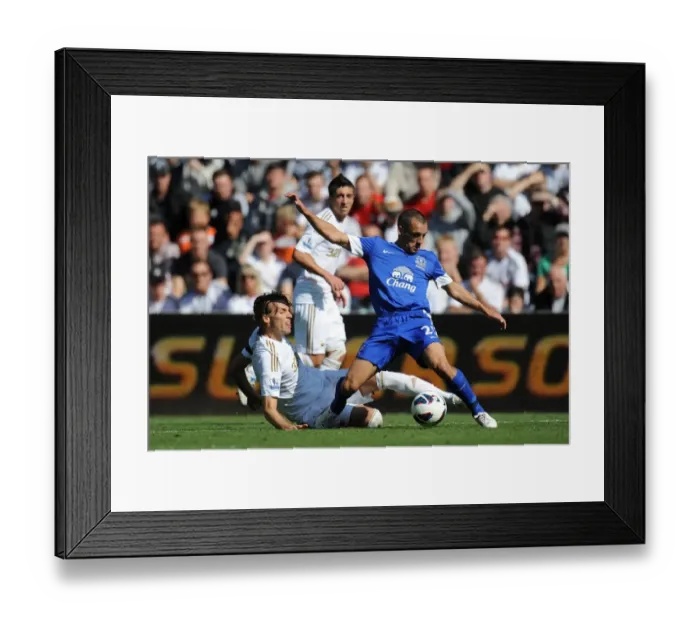 Framed Print : Michu Fouls Leon Osman: Everton's 3-0 Victory Over Swansea City (Barclays Premier League, Liberty Stadium, September 22, 2012) Framed Print : Michu Fouls Leon Osman: Everton's 3-0 Victory Over Swansea City (Barclays Premier League, Liberty Stadium, September 22, 2012)