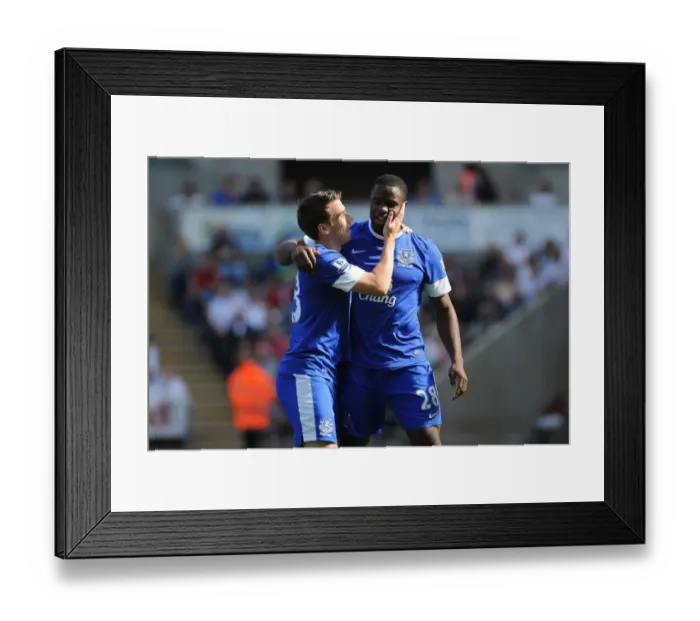 Framed Print : Anichebe's Triumph: Everton's Victor Anichebe Celebrates Goal with Seamus Coleman in 3-0 Victory over Swansea City (September 22, 2012)