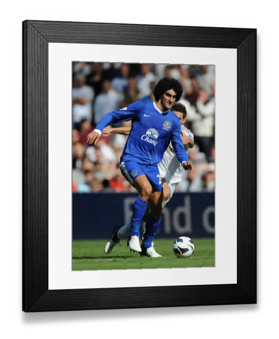Framed Print : Marouane Fellaini's Escape: Everton's Triumph Over Swansea City (3-0, September 22, 2012) Framed Print : Marouane Fellaini's Escape: Everton's Triumph Over Swansea City (3-0, September 22, 2012)