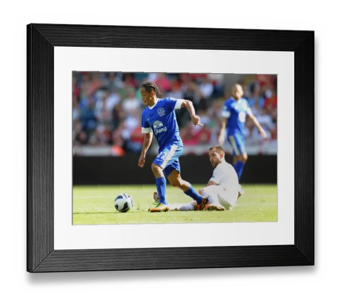 Framed Print : Steven Pienaar's Triumph: Fighting Past Swansea's Etay Shechter (Everton 3-0 Swansea City, September 22, 2012, Liberty Stadium) Framed Print : Steven Pienaar's Triumph: Fighting Past Swansea's Etay Shechter (Everton 3-0 Swansea City, September 22, 2012, Liberty Stadium)