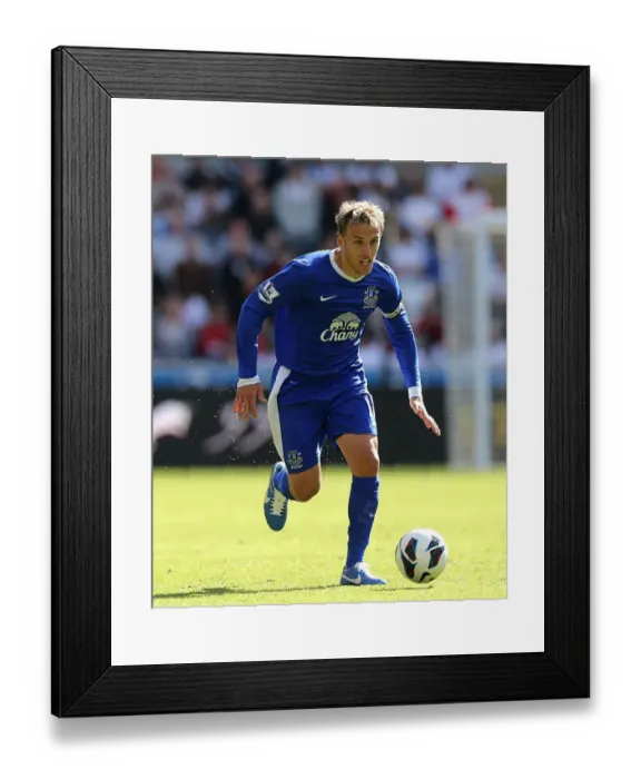 Framed Print : Phil Neville's Triumphant Moment: Everton's 3-0 Victory over Swansea City (September 22, 2012) Framed Print : Phil Neville's Triumphant Moment: Everton's 3-0 Victory over Swansea City (September 22, 2012)