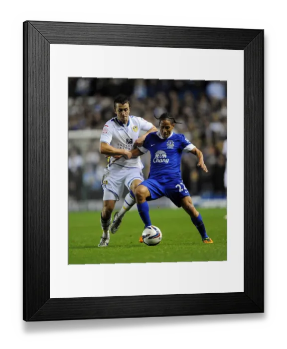 Framed Print : Battle for the Ball: Pienaar vs. Pugh - Capital One Cup Clash at Elland Road