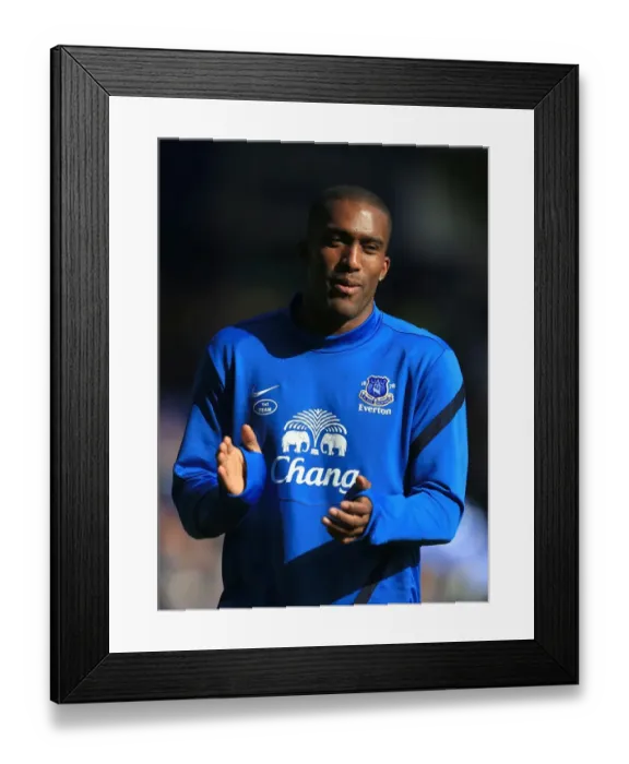 Framed Print : Everton's Glory: Sylvain Distin's Triumphant Celebration After Securing a 3-1 Victory Over Southampton (2012) Framed Print : Everton's Glory: Sylvain Distin's Triumphant Celebration After Securing a 3-1 Victory Over Southampton (2012)